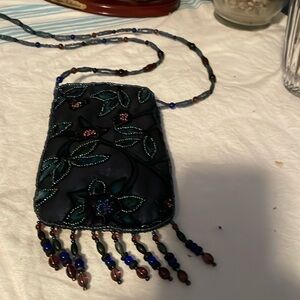 Beaded shoulder pouch , velvet back . Beautifully hand made